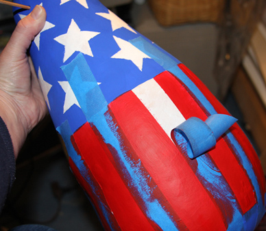 Peel back tape for red stripes of flag