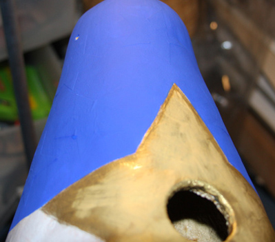 Gold star and stickers on primitive gourd centerpiece