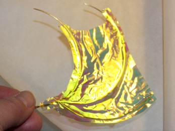 embossing Angelina film over fairy wing form